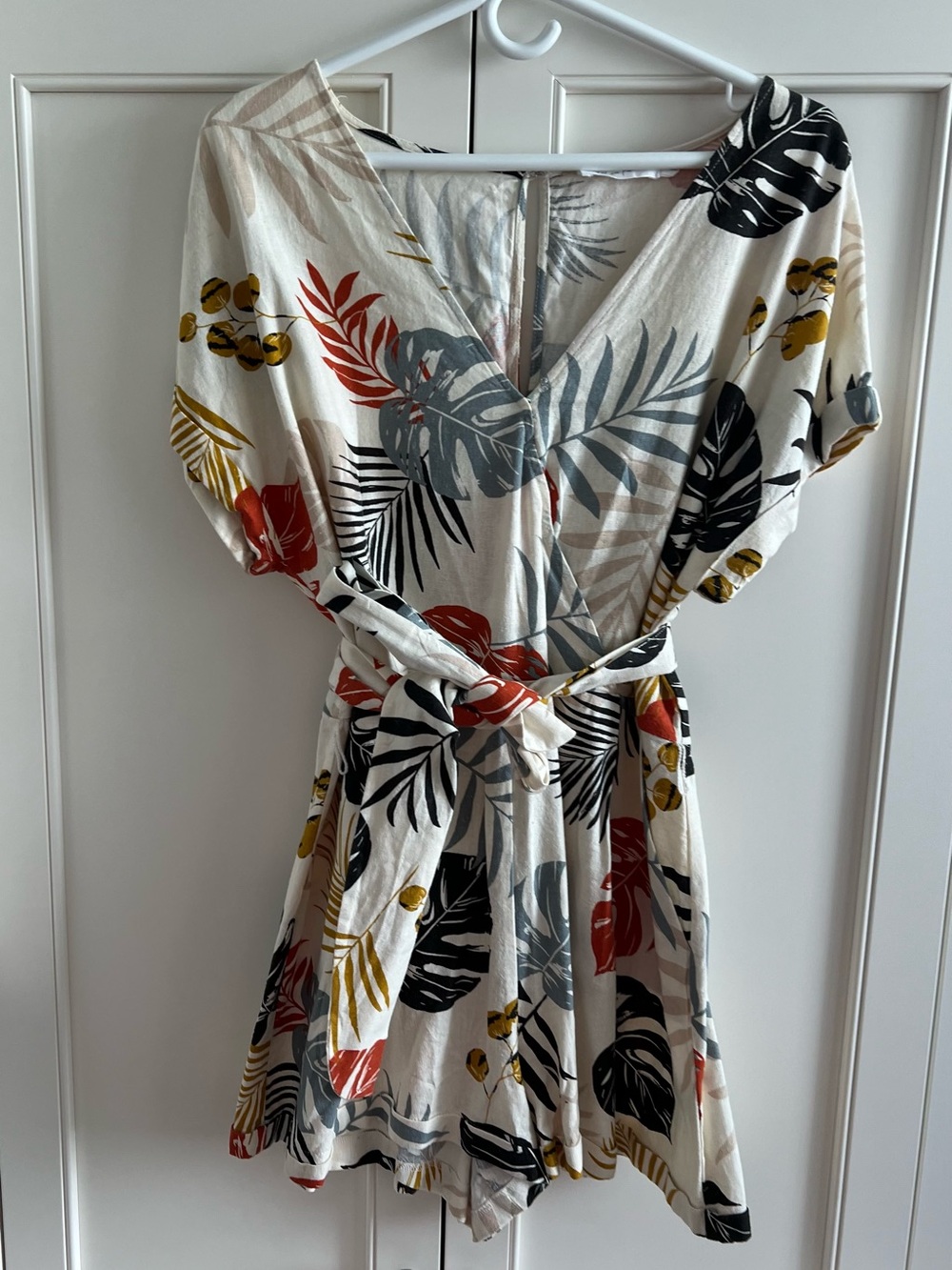 All in Favor Cream Tropical Wrap Romper with Multicolor Leaf Print